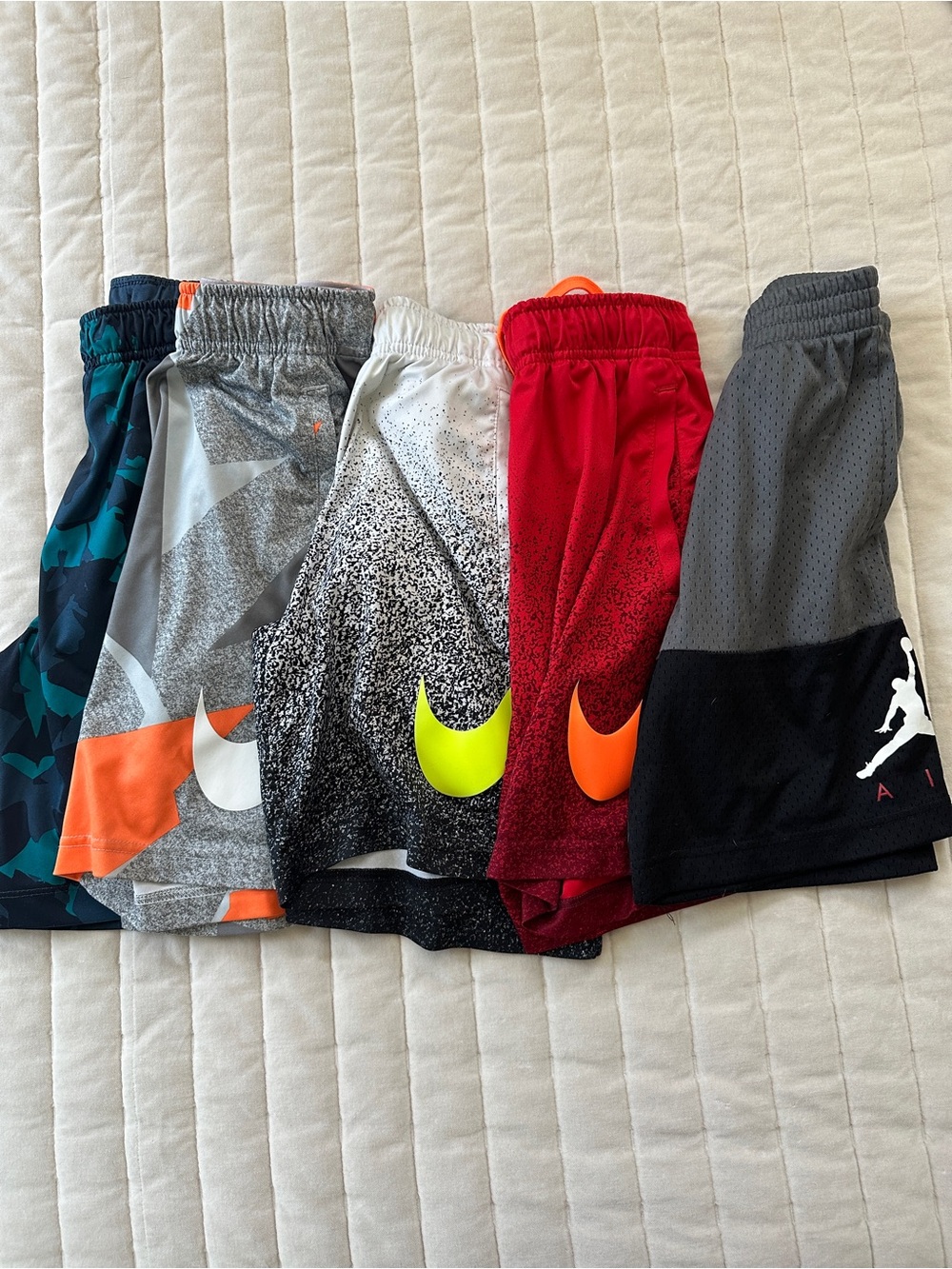 Nike Kids' Red Shorts with Orange Swoosh and Mixed Color Lot